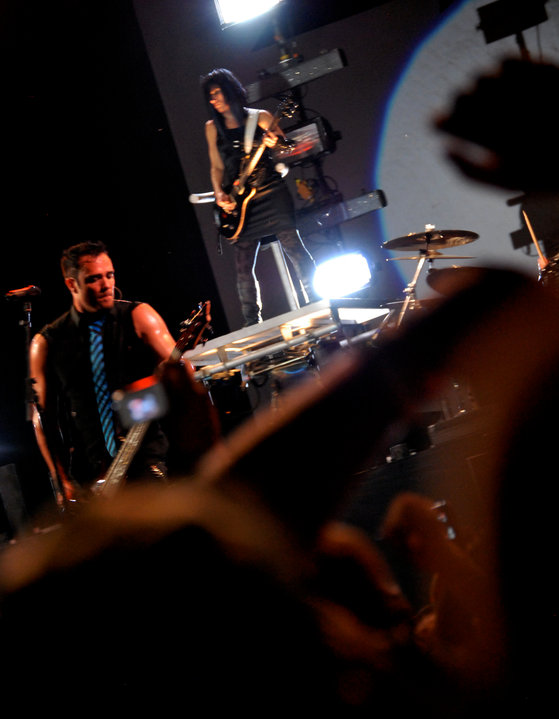 Headliner Skillet performing at another show