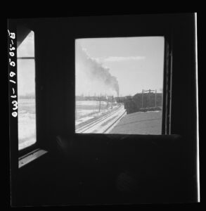 Streator (vicinity), Illinois. Passing an eastbound freight train on the Atchison, Topeka and Santa Fe Railroad between 