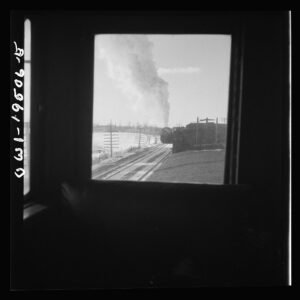 Related view: Streator (vicinity), Illinois. Passing an eastbound freight train on the Atchison, Topeka and Santa Fe Rai (2)